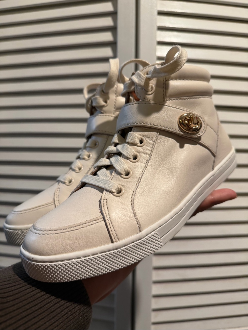 Coach White Leather High-Top Sneakers with Gold Logo Accent